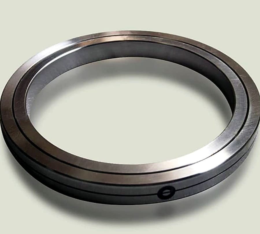 A finished machined ring with a ground outer surface.
