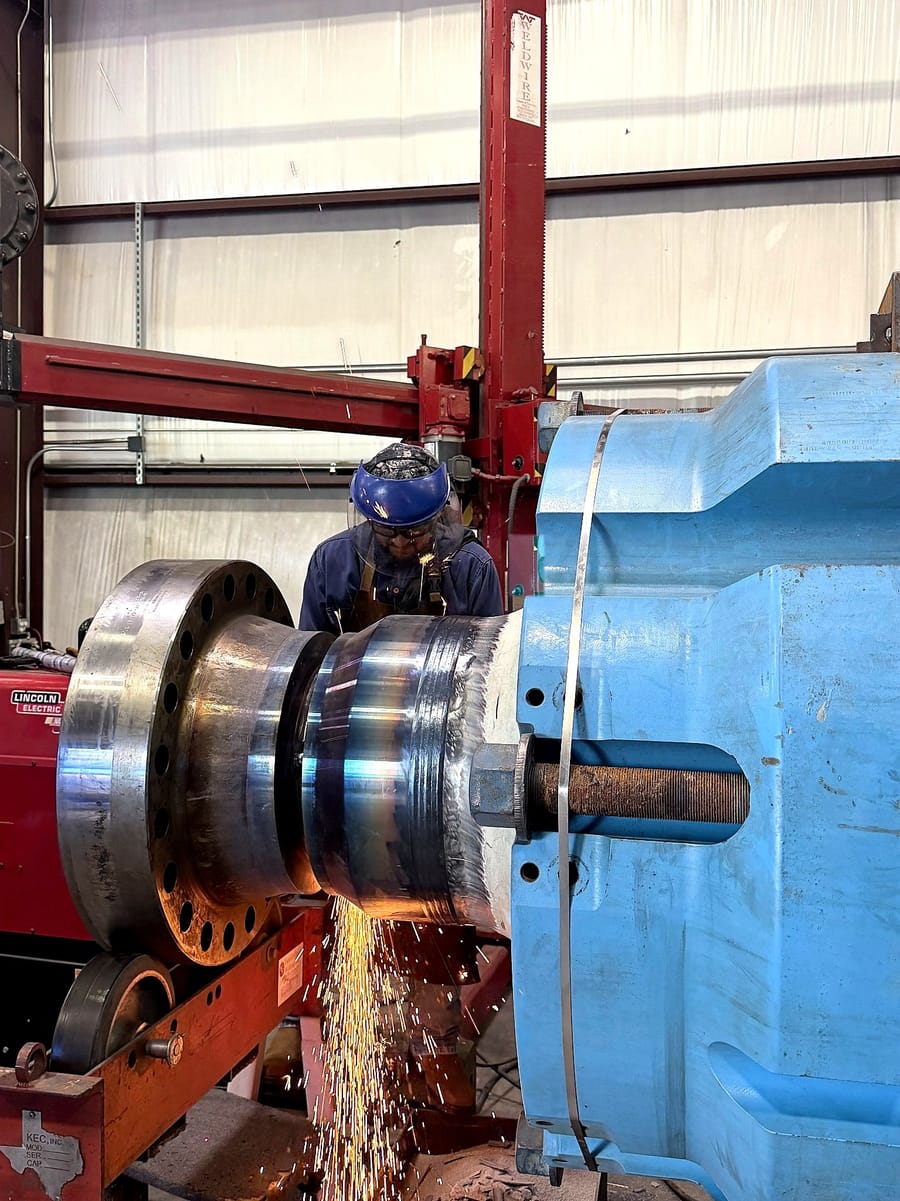 Grinding a built-up seal face on a large body turning in the positioner.